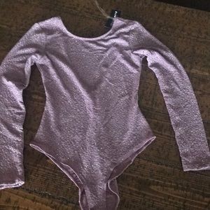 Lavender sparkly body suit